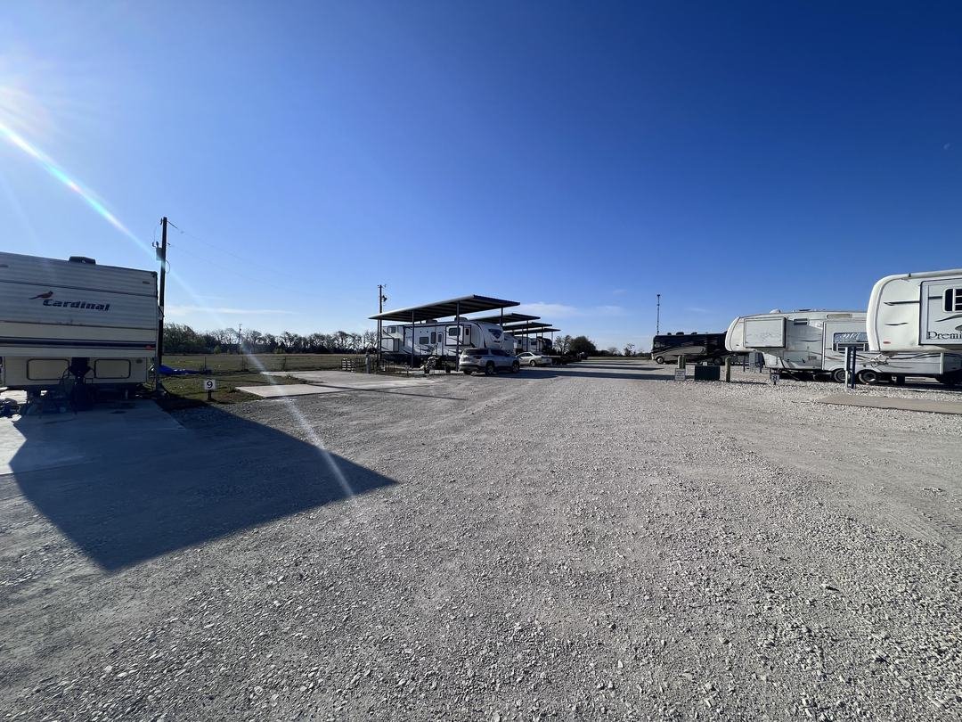 Travel trailer parked on a long-term monthly site at an RV park